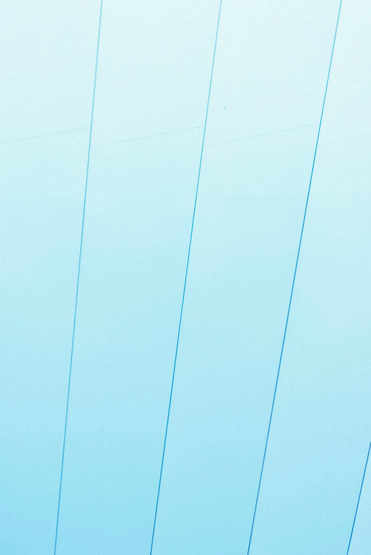 a man riding a snowboard on top of a snow covered slope