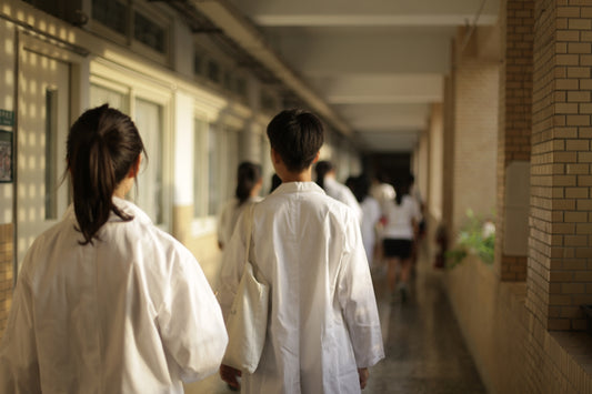 woman in white dress shirt