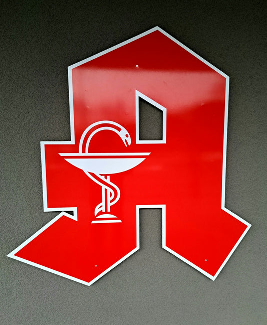 a red and white sign with a medical symbol on it