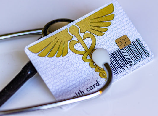A pair of scissors sitting on top of a white table